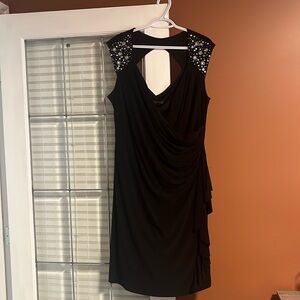 Plus size black evening dress with beaded shoulder detail